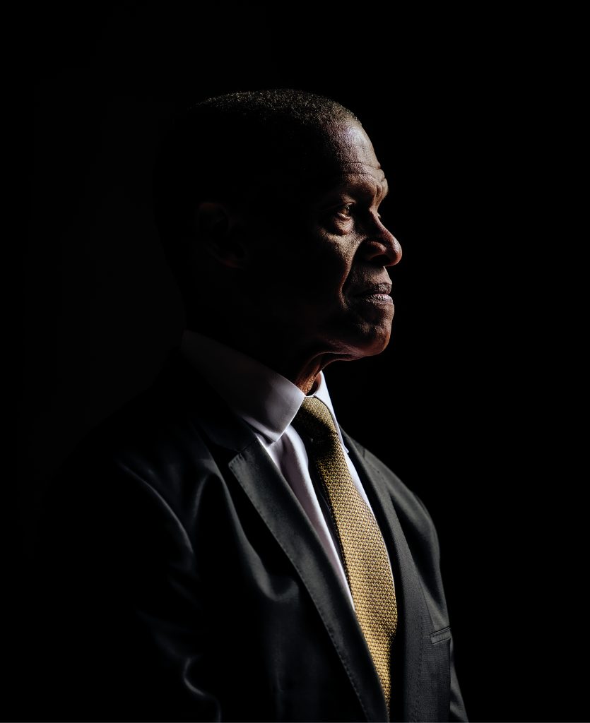 portrait of Erroll Southers on a dark background